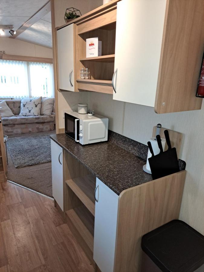 Отель 6 Berth Caravan On Marine Holiday Park Рил Экстерьер фото